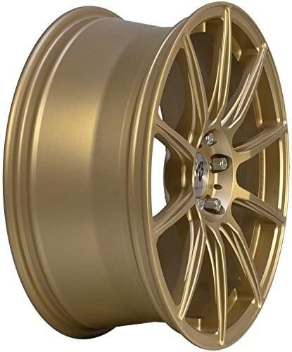 Goldene Alufelge mit Speichen